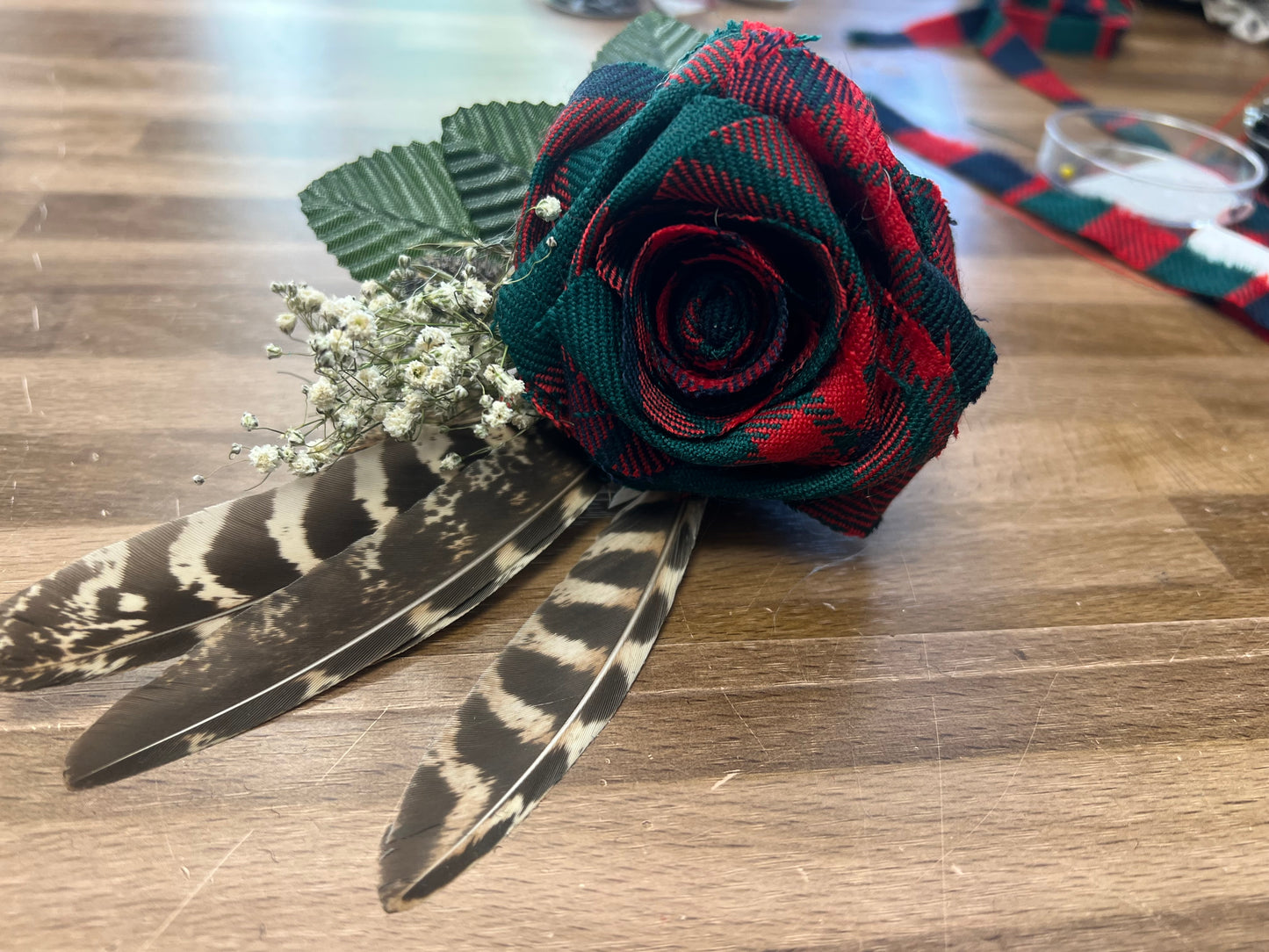 Tartan rose and pheasant feather buttonhole